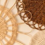 Boho wall decor with woven baskets arranged in a cluster on a textured wall
