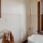 Cottage bathroom decorating ideas with a vintage clawfoot tub