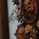 Cottagecore room decor with dried flowers hanging on the wall