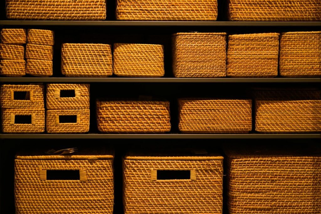 Shelf filled with wicker baskets