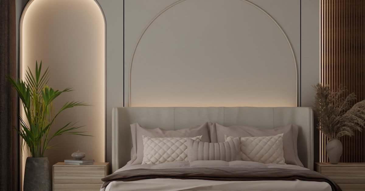 Japandi rug in a modern bedroom with an arched headboard and neutral decor