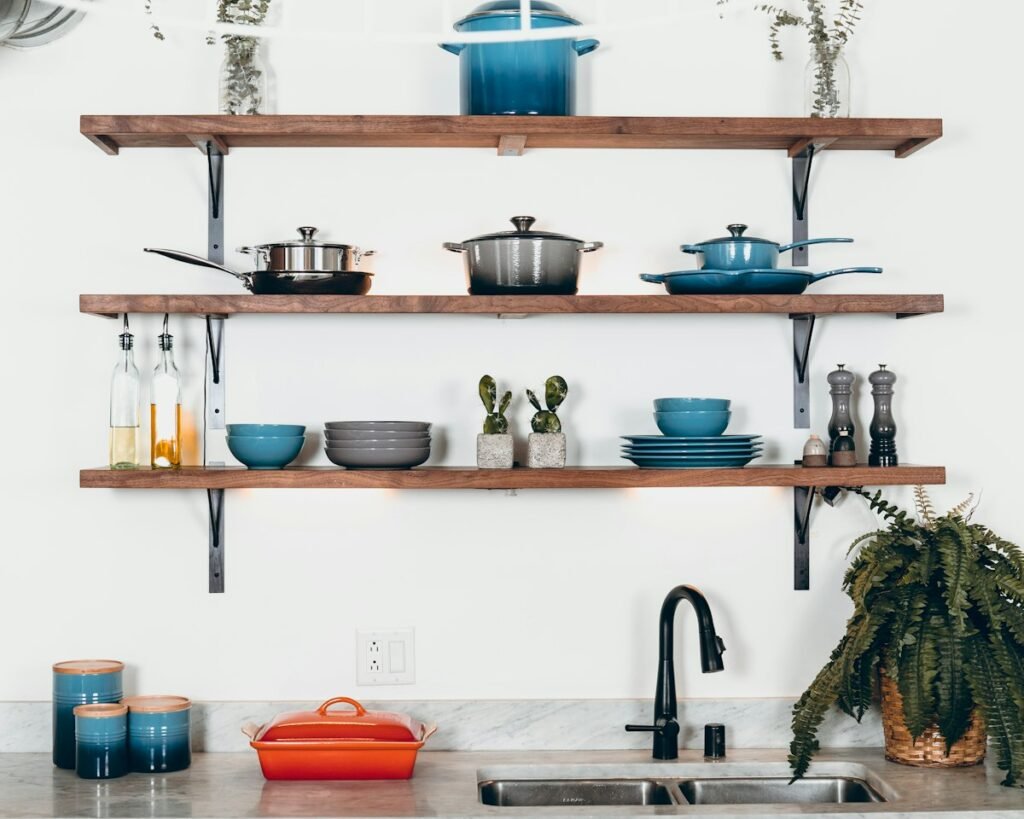 Cookware set out on floating shelves