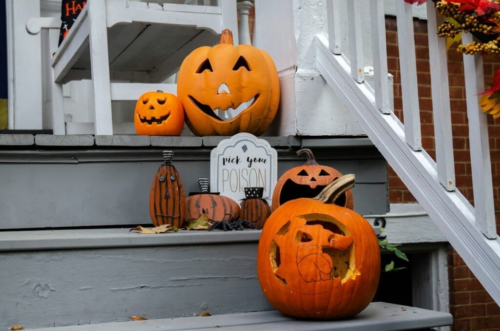 Two pumpkins sitting on a step