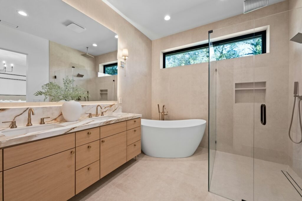 Bathroom with a freestanding tub and a double vanity
