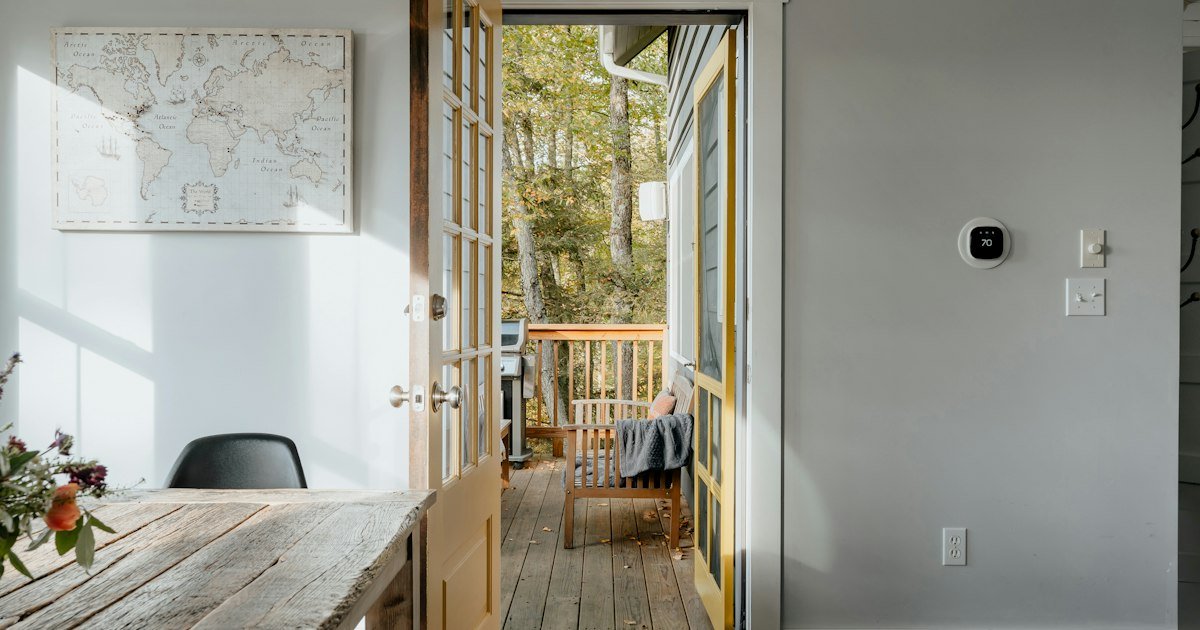 Entryway decor ideas with a wooden console table near a doorway