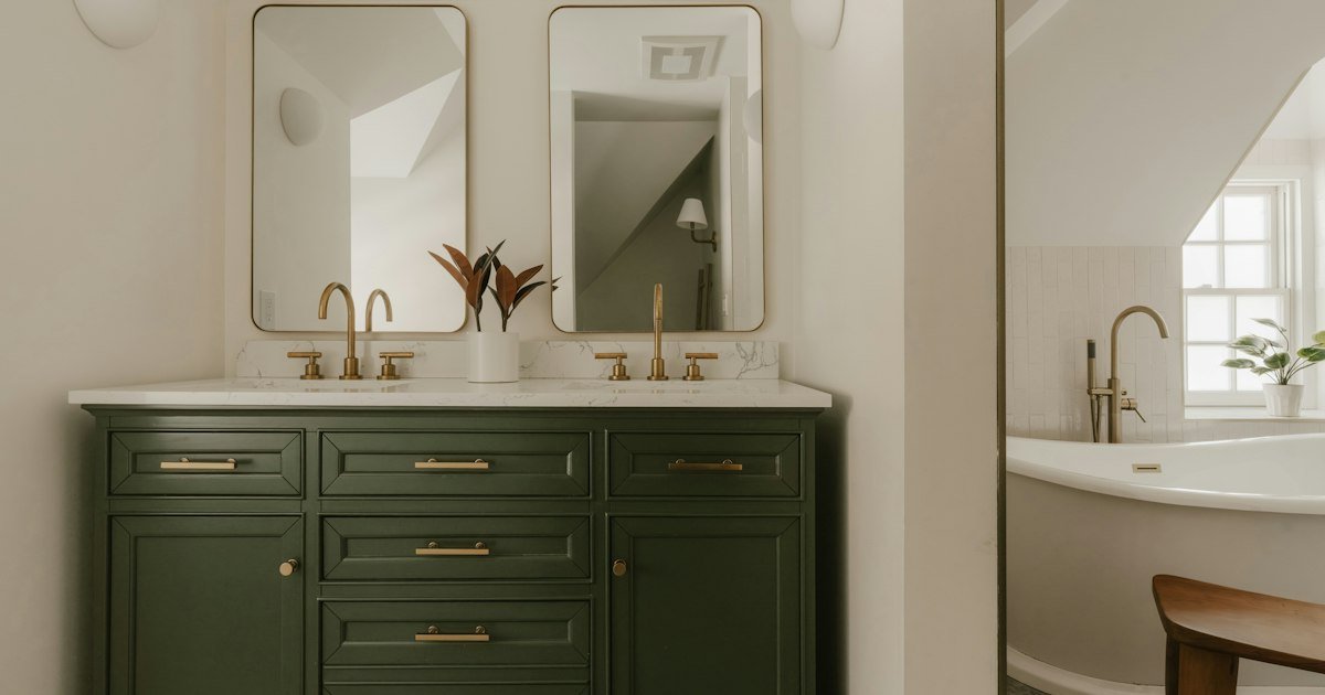 Jack and jill bathroom decorating ideas with a double vanity and two mirrors