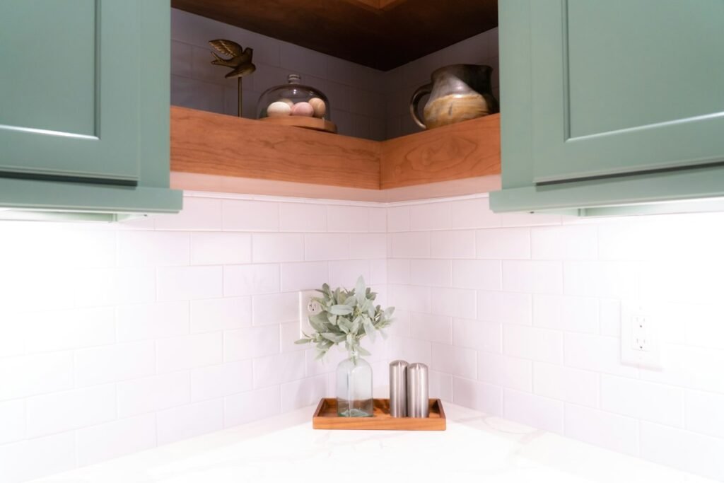 Kitchen corner with open cabinets and decorations