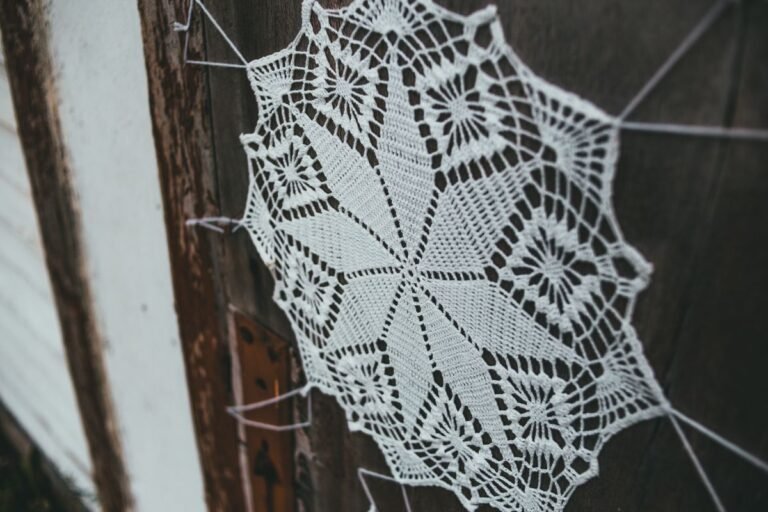 DIY doily wall decor: a handmade lace doily hung on a rustic wooden door